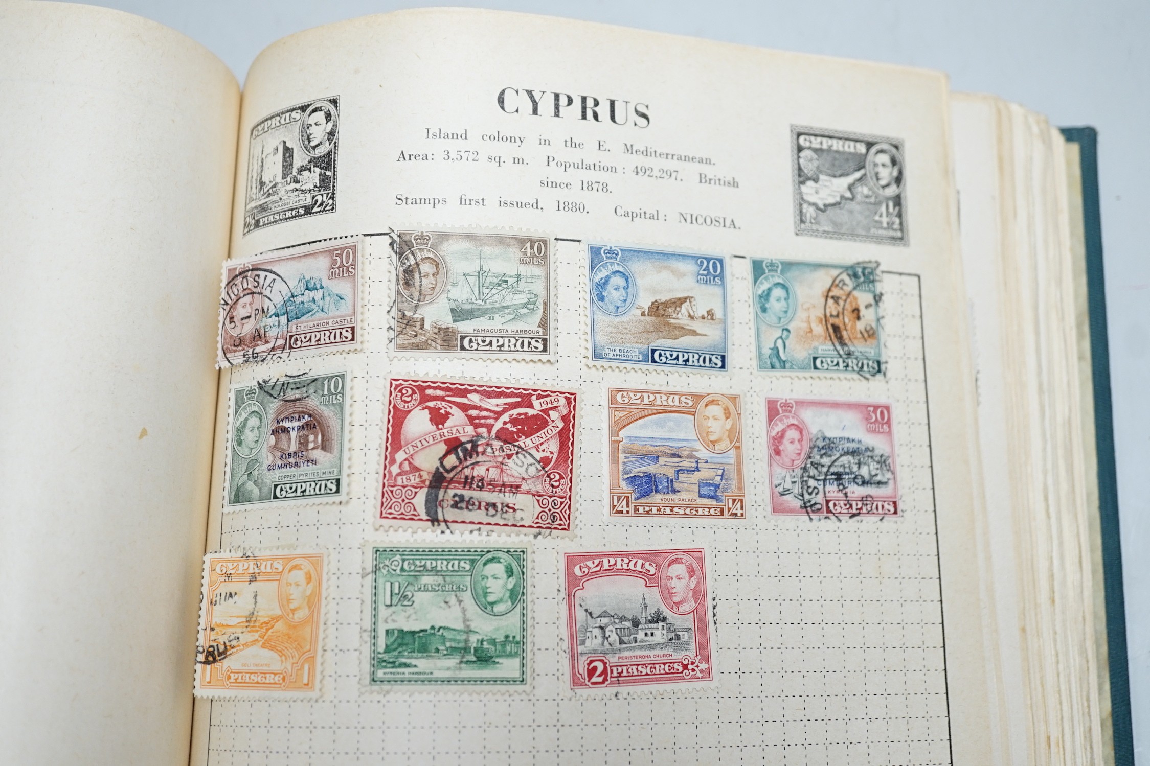 Four albums with Victorian and later Commonwealth and World stamps